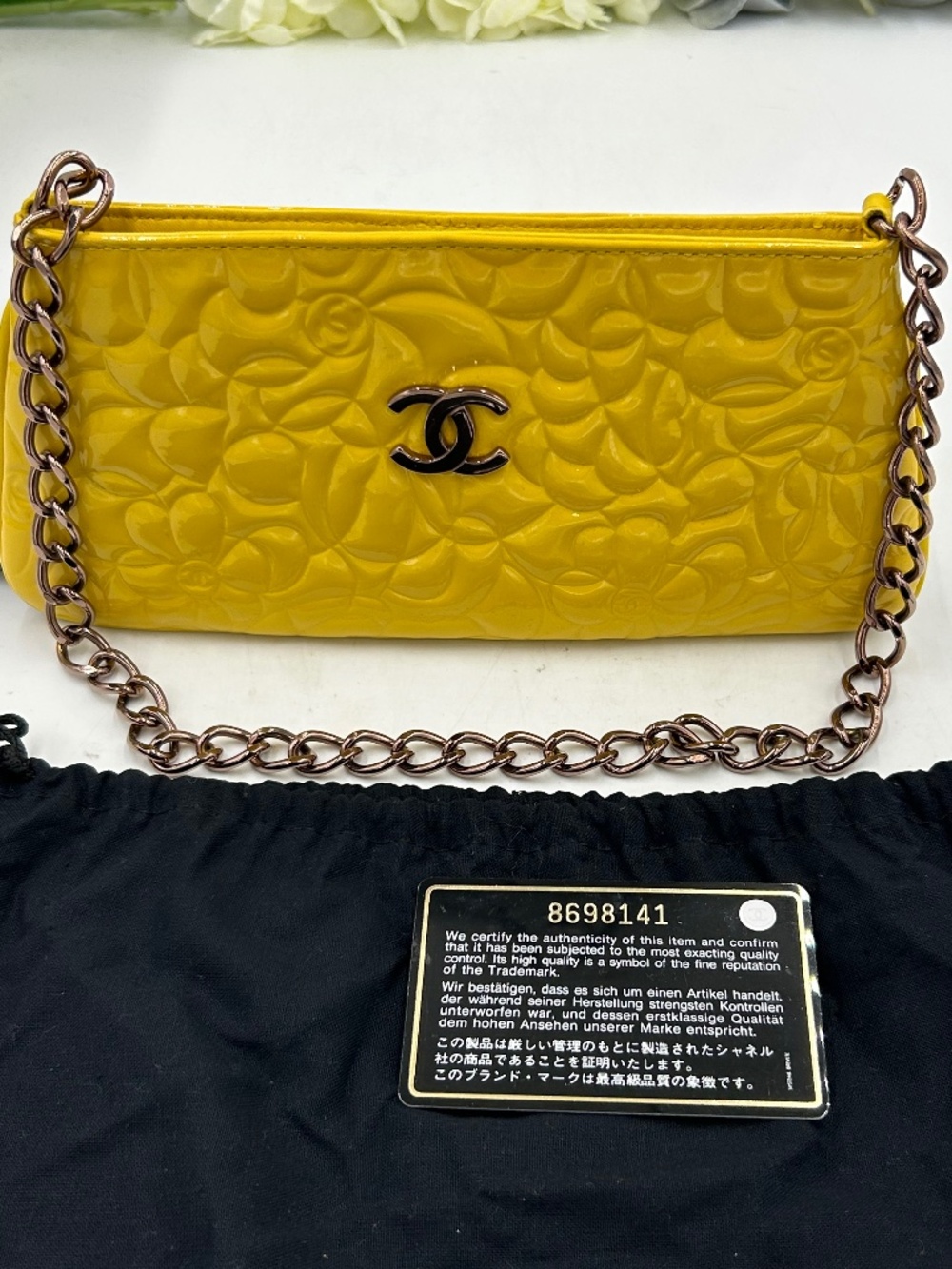 Women’s Chanel Patent Camellia Pochette. Made in Italy.